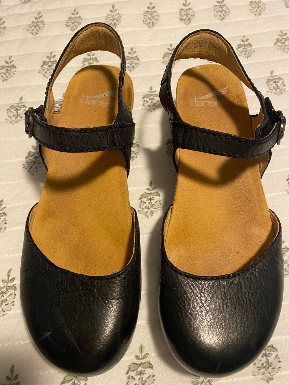 Dansko Black Leather Slingback Mules with Tan Footbed